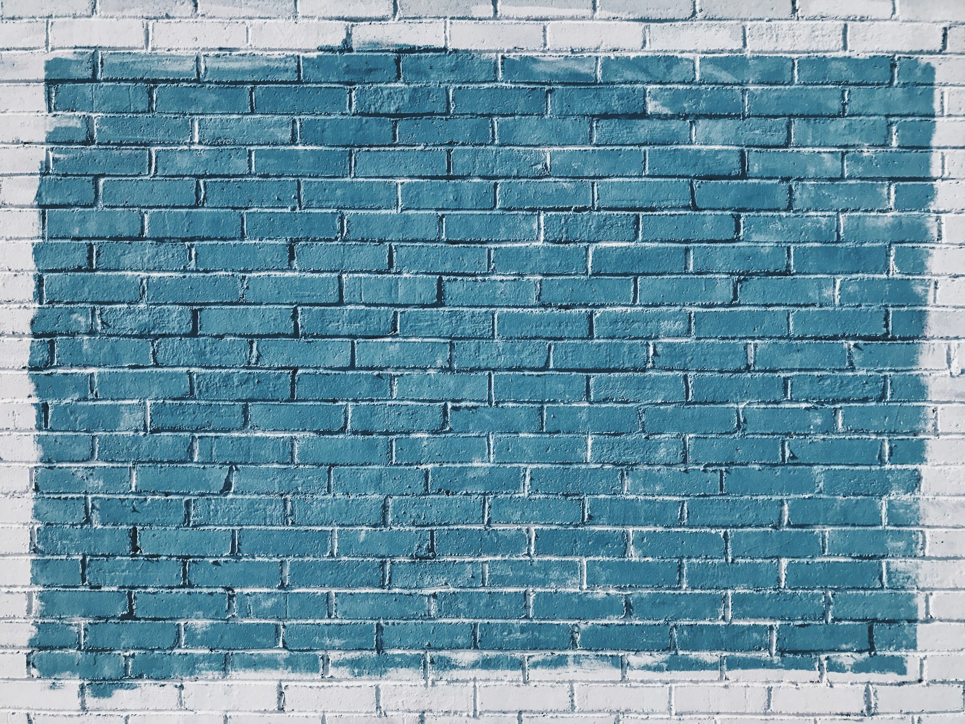 gray concrete bricks painted in blue Drazle